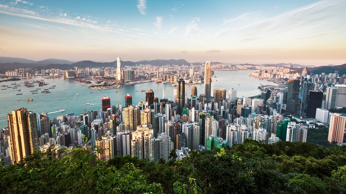 Victoria harbour of Hong Kong at sunset.