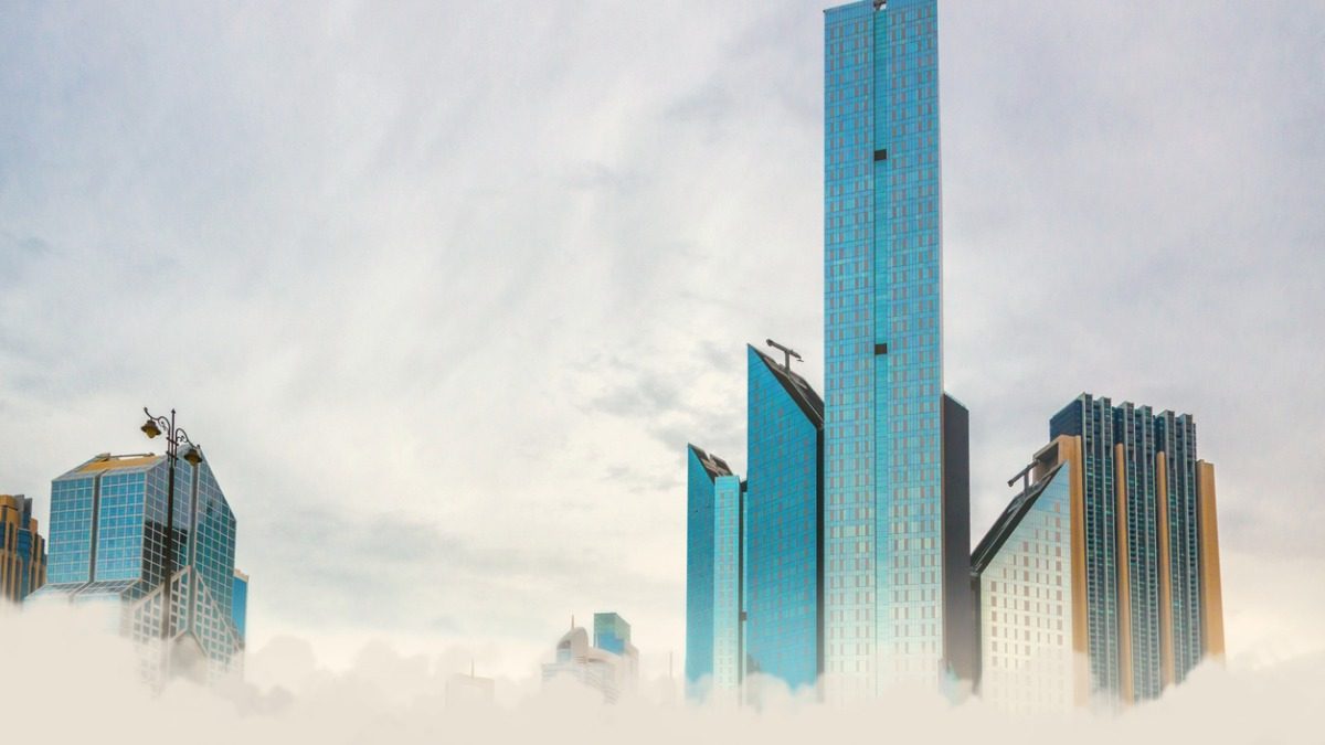 modern-skyscrapers-in-clouds-and-cloudy-sky-picture-id1154812936 copy
